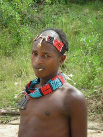 typicalyoungmanalongtheroadbetweenjinkaandkeyafaromovalleysouthethiopia.jpg