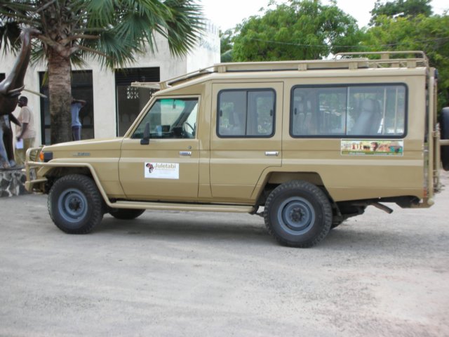 typicalsafarioperatorconversionofthecarwedrivethechassisisextendedandrearpassengersdoorsadded.jpg