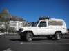 likeanewcaraftercrossingafricainthebackgroundisthelionsheadmountain_small.jpg