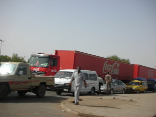 onasphaltroadsinsudanverylongtrucksareused2.jpg