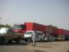 onasphaltroadsinsudanverylongtrucksareused2_small.jpg