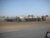 onasphaltroadsinsudanverylongtrucksareused3_small.jpg
