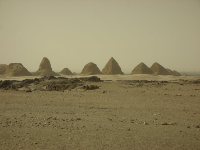 pyramidsatnuriyoucanseehowthedesertretrievesthematerialasthepyramidsarecrumblingtovariousdegrees.jpg